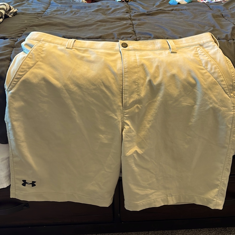 Tan men’s under armor shorts.